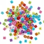 KORALIKI, 30 G, LITERKI CZARNE NA KOLOROWEJ BAZIE